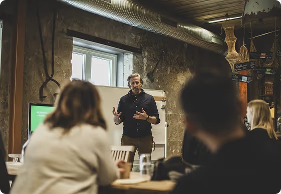 Five diverse professionals in a modern office setting
